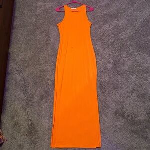 5.5 ft dress, slitted to mid thigh.